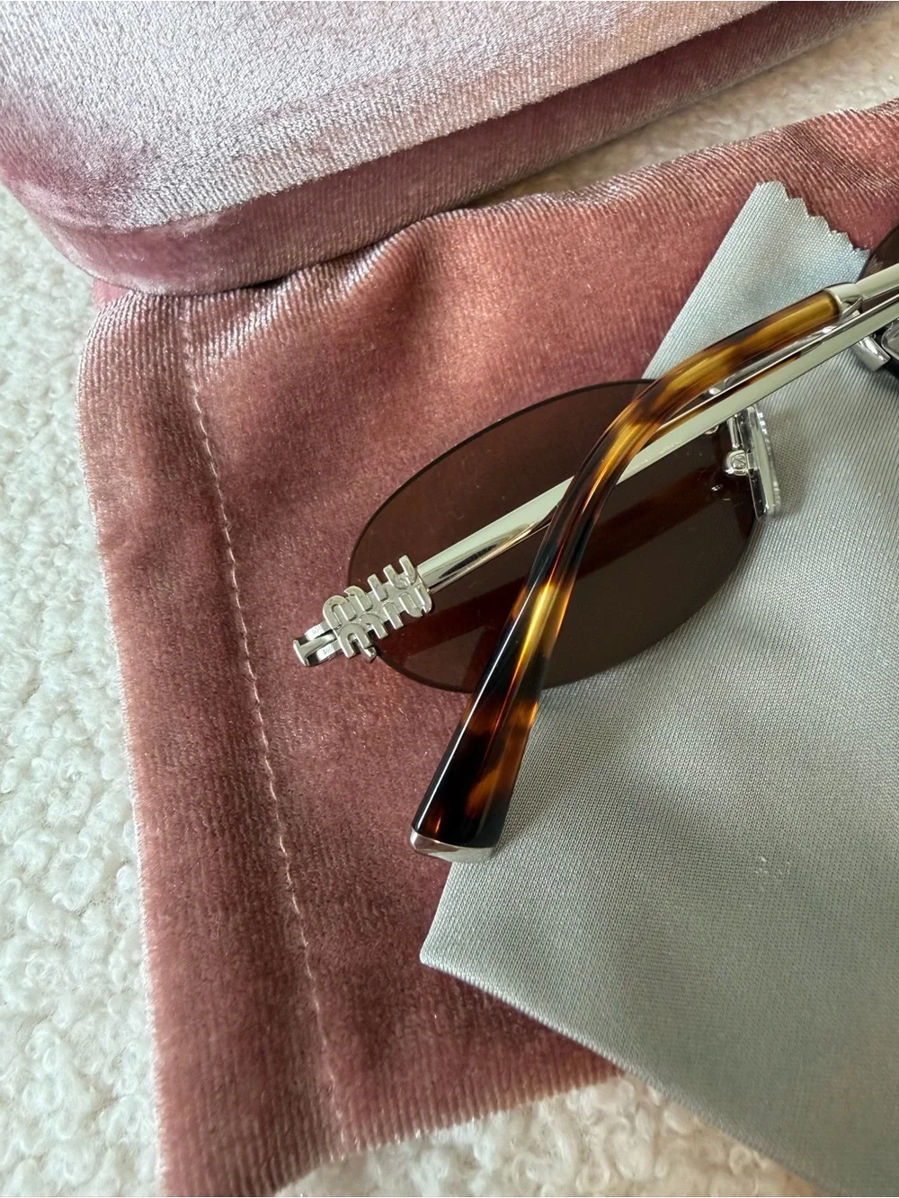 MIU MIU oval brown and silver sunglasses